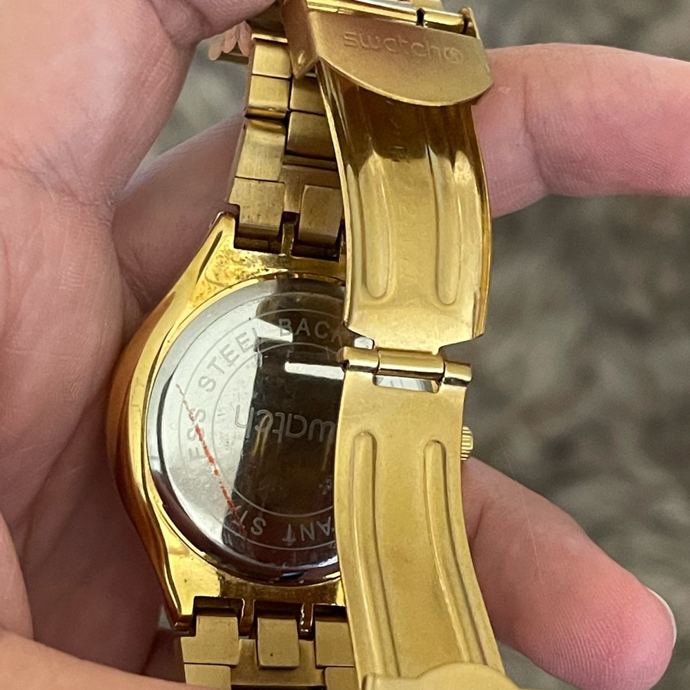 swatch brand watch.  Golden colour - Picture 5 of 8